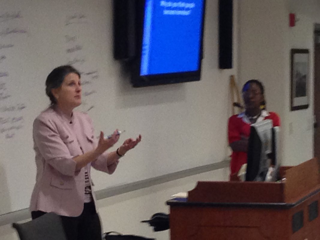 Dr. Linda Donaldson of CUA's National Catholic School of Social Service discusses homelessness in Washington, D.C. with one of her assistants.