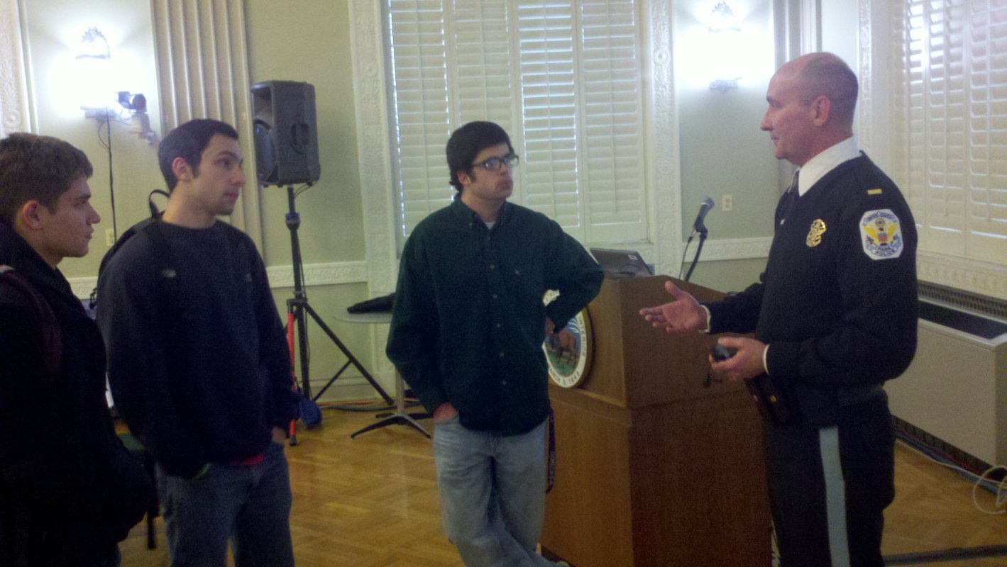 Mr. Dillon talks with Catholic students about the Park Police.